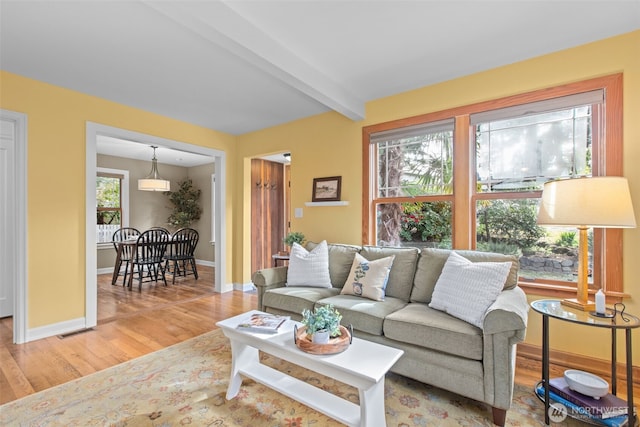 13527 23rd Ave NE, Seattle, WA 98125 - living room with light wood finished floors and beam ceiling
