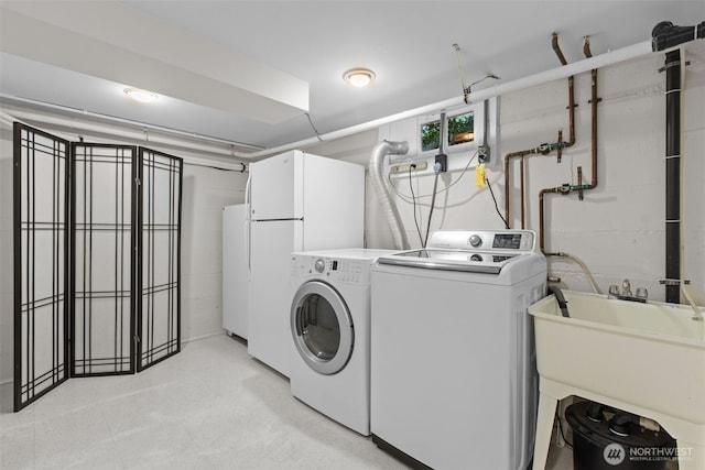 13527 23rd Ave NE, Seattle, WA 98125 - washroom featuring separate washer and dryer