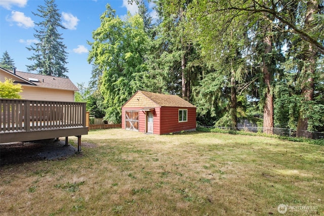 13527 23rd Ave NE, Seattle, WA 98125 - fenced backyard featuring a storage unit and a wooden deck