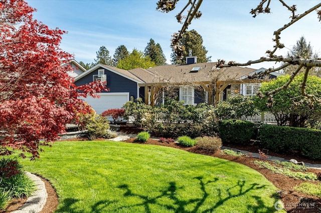 5681 Lenz Pl, Langley, WA 98260 - view of front of home featuring an attached garage and a front yard