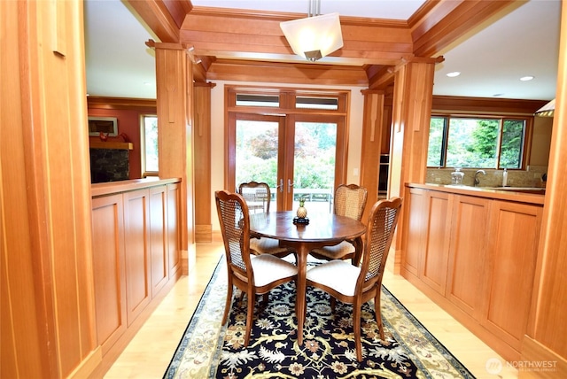 133 Fairway Pl, Sequim, WA 98382 - dining space featuring crown molding, french doors, and light wood-style flooring