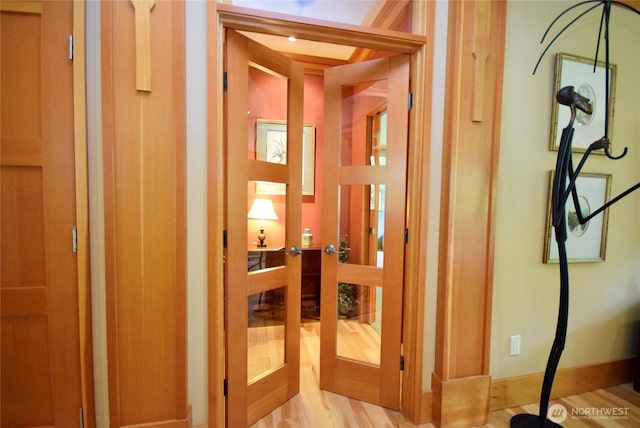 133 Fairway Pl, Sequim, WA 98382 - hall featuring french doors and wood finished floors