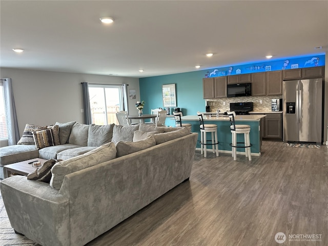 9151 Viola St SE, Tumwater, WA 98501 - living area featuring dark wood finished floors and recessed lighting