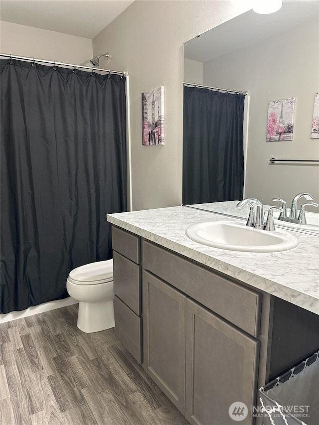 9151 Viola St SE, Tumwater, WA 98501 - bathroom with vanity, wood finished floors, and a shower with curtain