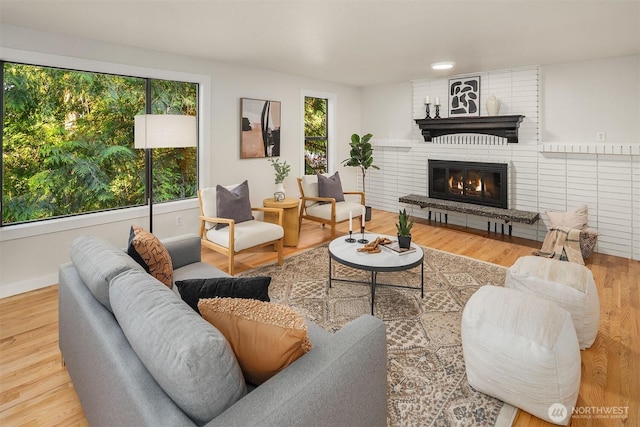 1820 NE 177th St, Shoreline, WA 98155 - living area with a fireplace and wood finished floors