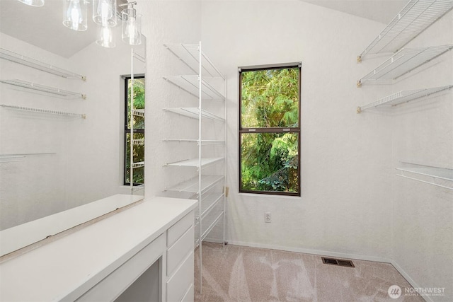 1820 NE 177th St, Shoreline, WA 98155 - spacious closet with light colored carpet and a chandelier