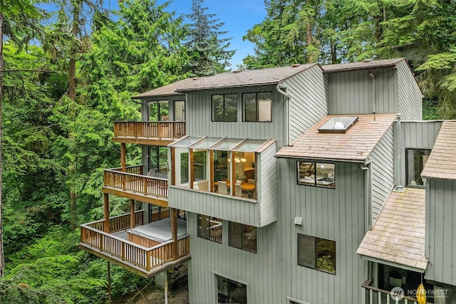 1820 NE 177th St, Shoreline, WA 98155 - back of house with roof with shingles, a balcony, and a wooden deck