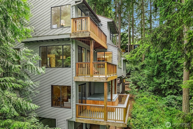 1820 NE 177th St, Shoreline, WA 98155 - rear view of house with a balcony and a hot tub