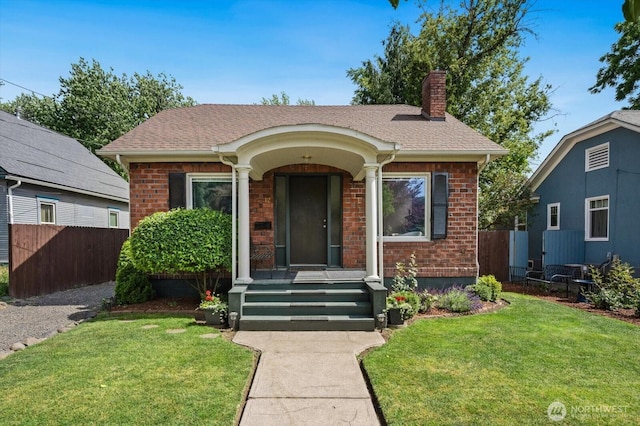 12 Newell St, Walla Walla, WA 99362 - bungalow-style home featuring a chimney, brick siding, and roof with shingles