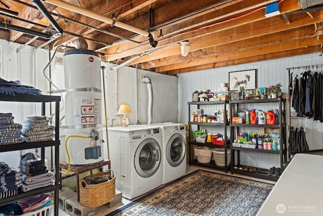12 Newell St, Walla Walla, WA 99362 - washroom featuring secured water heater and washer and clothes dryer