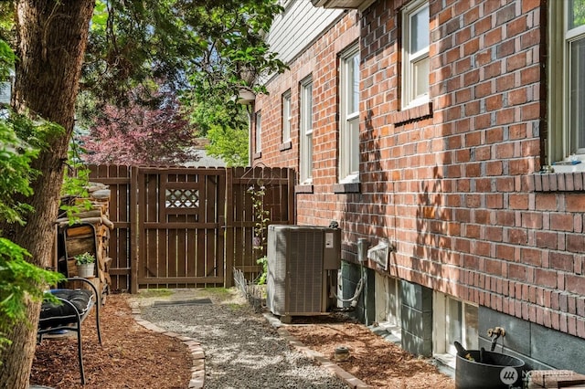 12 Newell St, Walla Walla, WA 99362 - view of property exterior with brick siding and a gate
