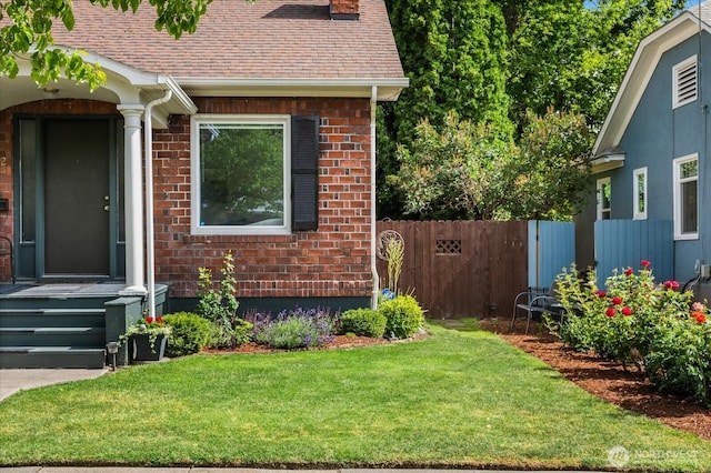 12 Newell St, Walla Walla, WA 99362 - view of home's exterior with brick siding and a shingled roof