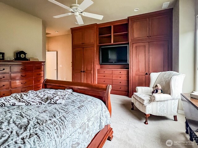 8621 Bainbridge Loop NE, Lacey, WA 98516 - bedroom featuring light carpet and ceiling fan