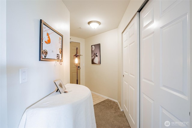 3201 Pacific Ave Unit 403, Tacoma, WA 98418 - carpeted bedroom with a closet and tile patterned flooring
