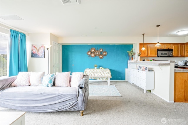 3201 Pacific Ave Unit 403, Tacoma, WA 98418 - living room featuring light colored carpet