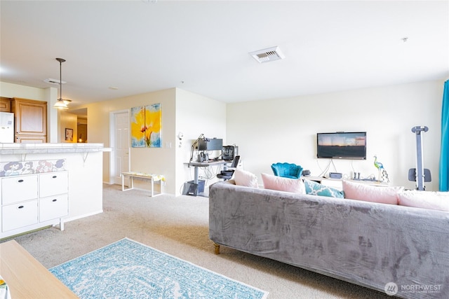 3201 Pacific Ave Unit 403, Tacoma, WA 98418 - living area featuring light colored carpet and baseboards