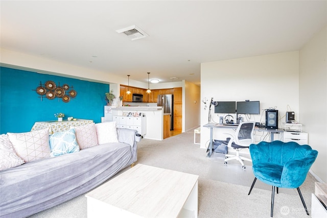 3201 Pacific Ave Unit 403, Tacoma, WA 98418 - living room with an office area and light colored carpet
