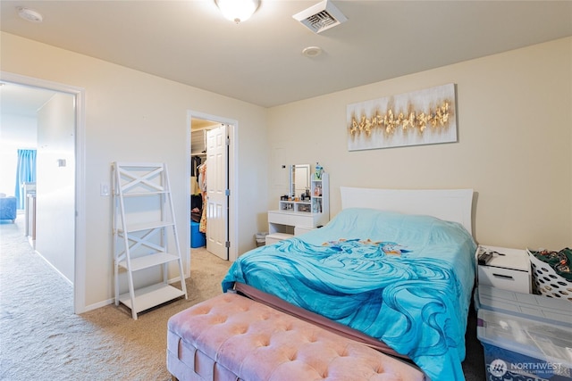 3201 Pacific Ave Unit 403, Tacoma, WA 98418 - bedroom with carpet floors, a walk in closet, and a closet