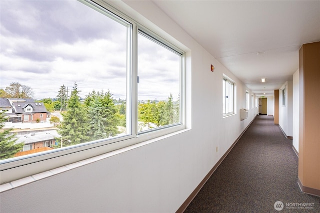 3201 Pacific Ave Unit 403, Tacoma, WA 98418 - hall featuring baseboards and dark colored carpet