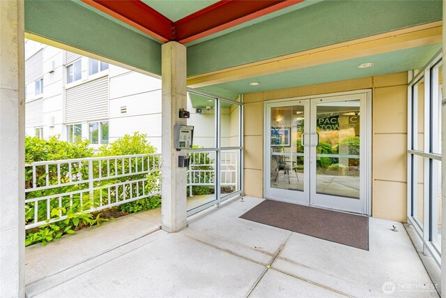3201 Pacific Ave Unit 403, Tacoma, WA 98418 - entrance to property featuring french doors and stucco siding