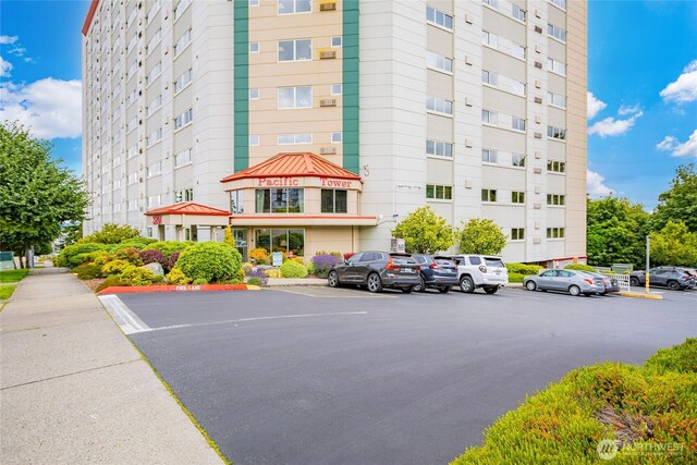 3201 Pacific Ave Unit 403, Tacoma, WA 98418 - view of building exterior with uncovered parking