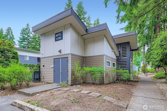 14760 NE 31st St Unit A105, Bellevue, WA 98007 - rear view of house with stairs