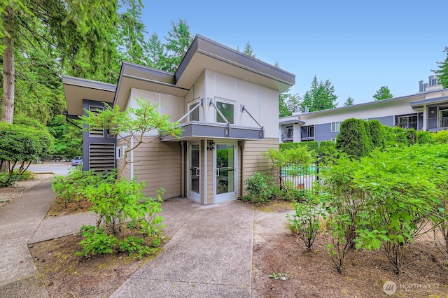 14760 NE 31st St Unit A105, Bellevue, WA 98007 - view of front of house with a balcony