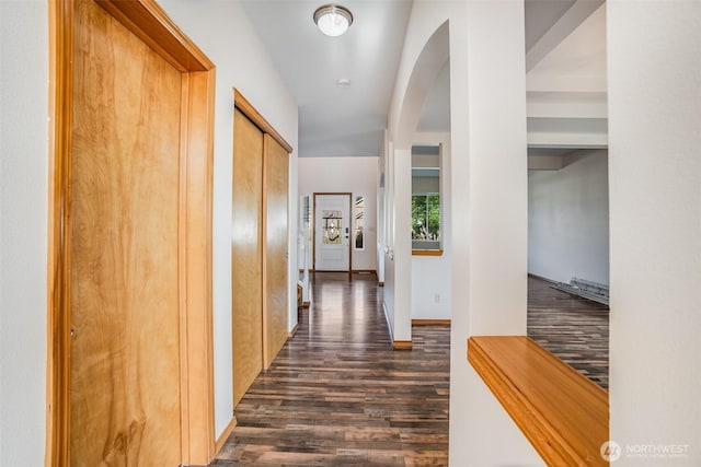 807 Williams St NW, Orting, WA 98360 - corridor with dark wood-type flooring and arched walkways