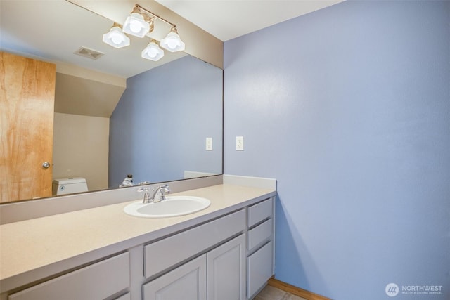 807 Williams St NW, Orting, WA 98360 - bathroom featuring vanity and toilet