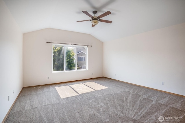 807 Williams St NW, Orting, WA 98360 - carpeted spare room featuring a ceiling fan and lofted ceiling