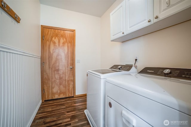 807 Williams St NW, Orting, WA 98360 - laundry room featuring separate washer and dryer, cabinet space, and dark wood finished floors