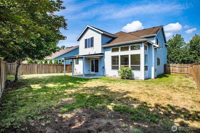 807 Williams St NW, Orting, WA 98360 - rear view of house featuring a patio area, a fenced backyard, and a shingled roof