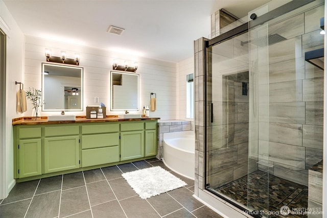 20313 194th Ave E, Orting, WA 98360 - bathroom featuring tile patterned flooring, double vanity, a stall shower, and a bath