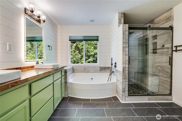 20313 194th Ave E, Orting, WA 98360 - bathroom featuring vanity, a bath, a stall shower, and tile patterned flooring