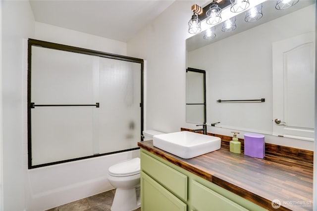 20313 194th Ave E, Orting, WA 98360 - full bath with vanity, bath / shower combo with glass door, and tile patterned floors