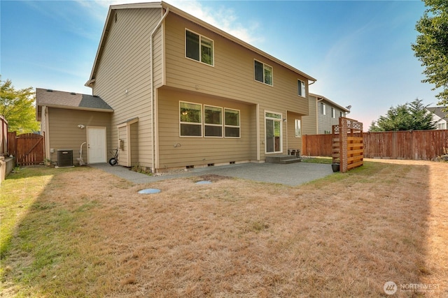 20313 194th Ave E, Orting, WA 98360 - back of property featuring a patio area, a fenced backyard, a gate, and crawl space