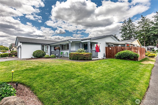 17612 19th Ave E Unit 83, Spanaway, WA 98387 - ranch-style house featuring a garage, covered porch, and driveway