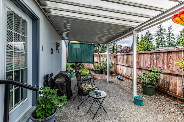 17612 19th Ave E Unit 83, Spanaway, WA 98387 - fenced backyard featuring grilling area and a patio