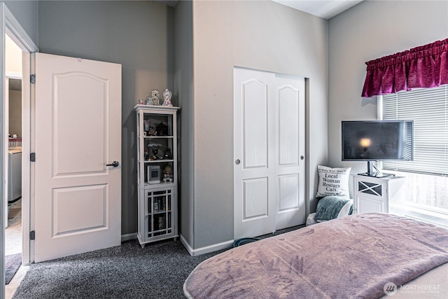 17612 19th Ave E Unit 83, Spanaway, WA 98387 - bedroom featuring dark colored carpet and baseboards