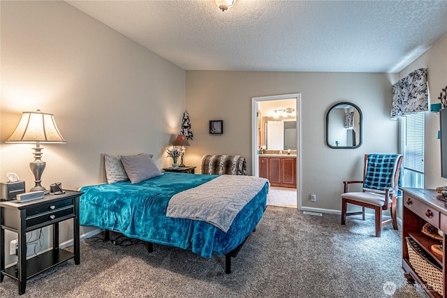 17612 19th Ave E Unit 83, Spanaway, WA 98387 - bedroom with a textured ceiling, carpet, connected bathroom, and lofted ceiling