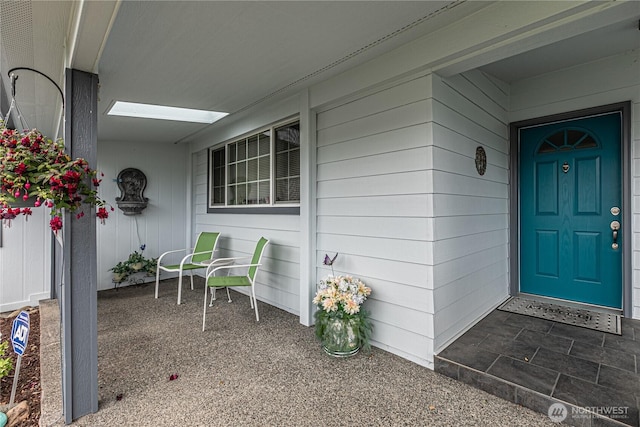 17612 19th Ave E Unit 83, Spanaway, WA 98387 - view of exterior entry featuring a porch