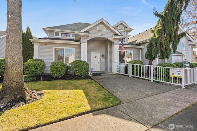 17612 19th Ave E Unit 83, Spanaway, WA 98387 - view of front of home with a shingled roof and covered porch