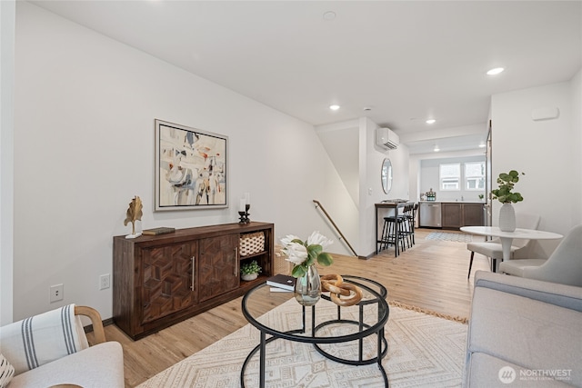 1339 Nolta Loop NE, Bainbridge Island, WA 98110 - living area with a wall mounted air conditioner, light wood-style floors, and recessed lighting