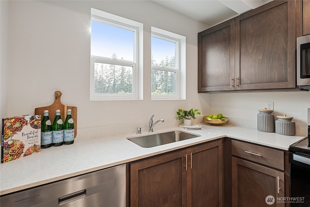 1339 Nolta Loop NE, Bainbridge Island, WA 98110 - kitchen with appliances with stainless steel finishes, dark brown cabinets, and light countertops