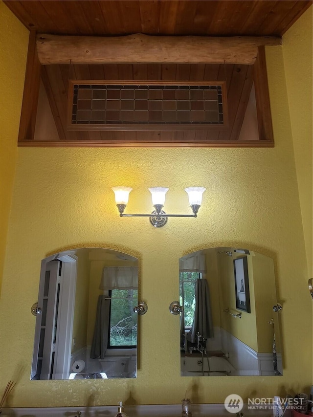 70 NE Wanda Ln, Belfair, WA 98528 - detailed view of a wooden ceiling with exposed beams and arched walkways