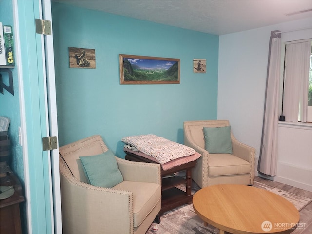 70 NE Wanda Ln, Belfair, WA 98528 - living area with wood finished floors