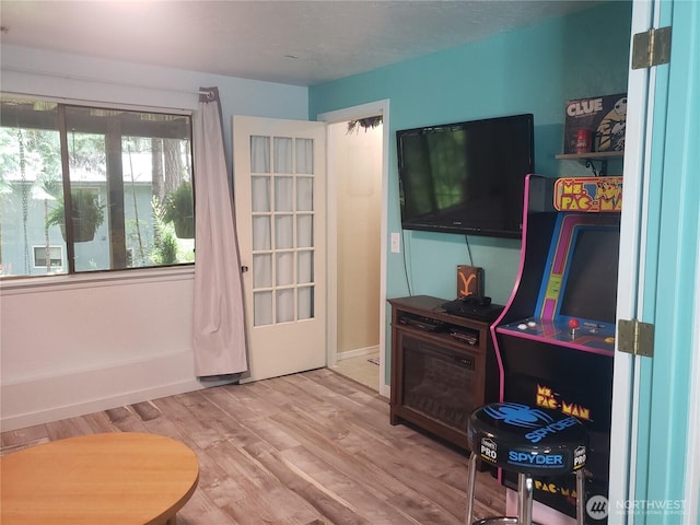 70 NE Wanda Ln, Belfair, WA 98528 - living room featuring wood finished floors and baseboards