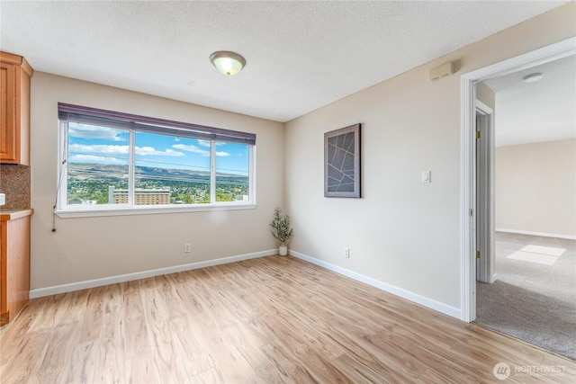 201 Pennsylvania Ave Unit 15, Wenatchee, WA 98801 - unfurnished dining area featuring light wood-type flooring