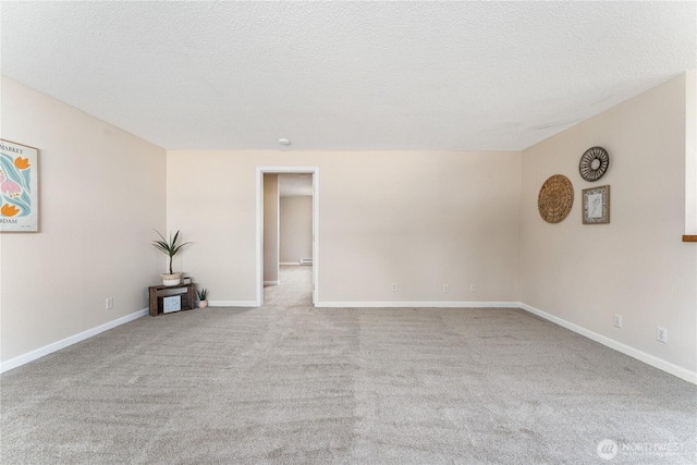201 Pennsylvania Ave Unit 15, Wenatchee, WA 98801 - carpeted empty room featuring baseboards and a textured ceiling