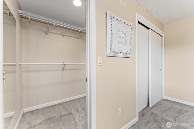 201 Pennsylvania Ave Unit 15, Wenatchee, WA 98801 - walk in closet featuring carpet flooring